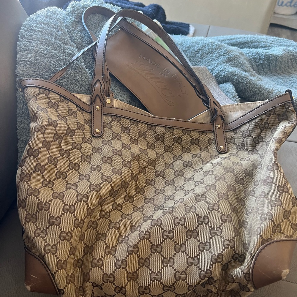 Selling Gucci tote bag. Used it for a few months as a diaper bag!